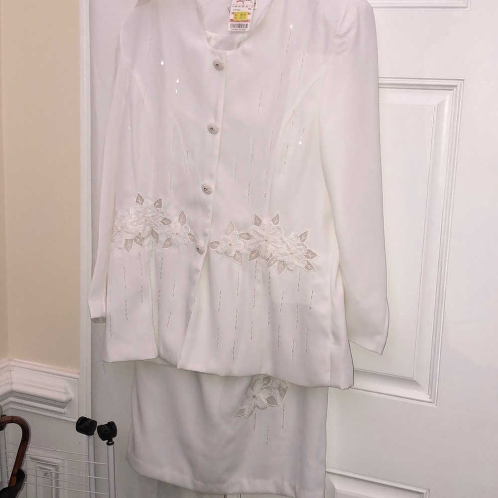 Beautiful skirt and jacket Are size 14..